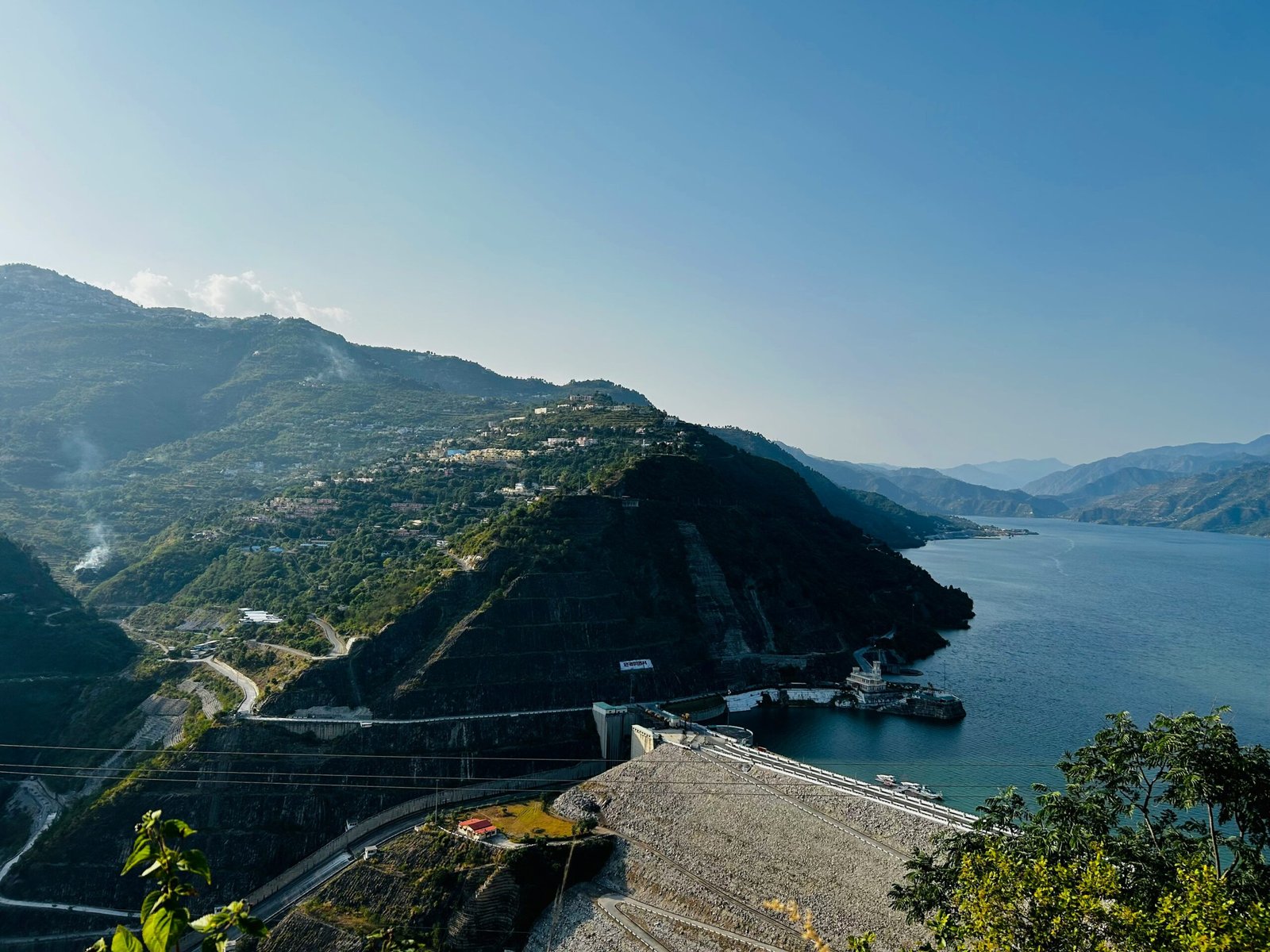 A large body of water surrounded by mountains